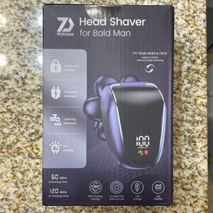 New in box unopened Men & Women’s multi use electric shaver with accessories.